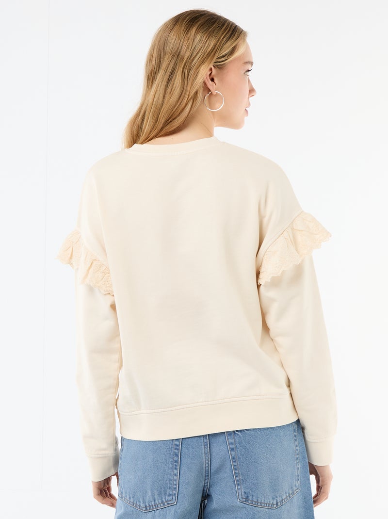 Sweat uni avec volants en borderies anglaises sur les manches Blanc - Kiabi