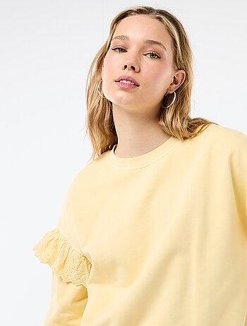 Sweat uni avec volants en borderies anglaises sur les manches