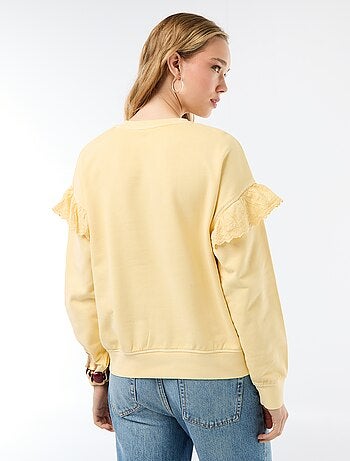 Sweat uni avec volants en borderies anglaises sur les manches