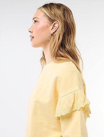 Sweat uni avec volants en borderies anglaises sur les manches