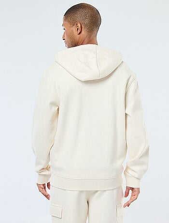 Sweat uni en maille piquée à capuche