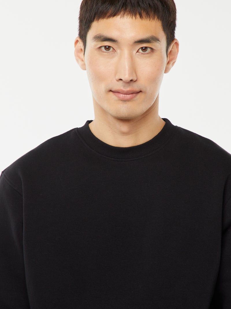 Sweat uni en molleton à col rond Noir - Kiabi