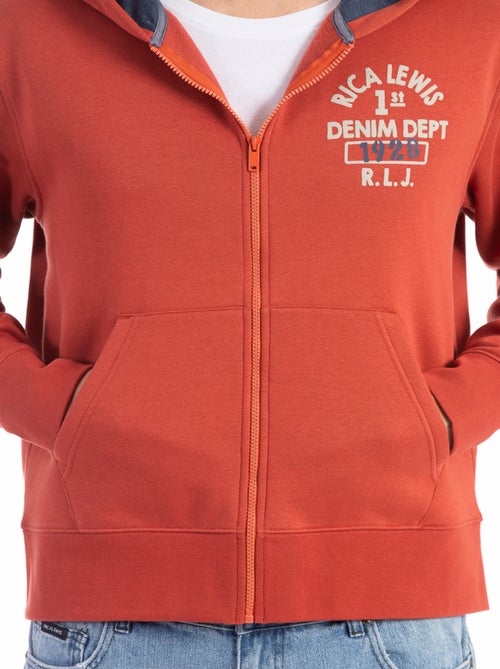 Sweat zippé à capuche DJANGO  'Rica Lewis' - Kiabi