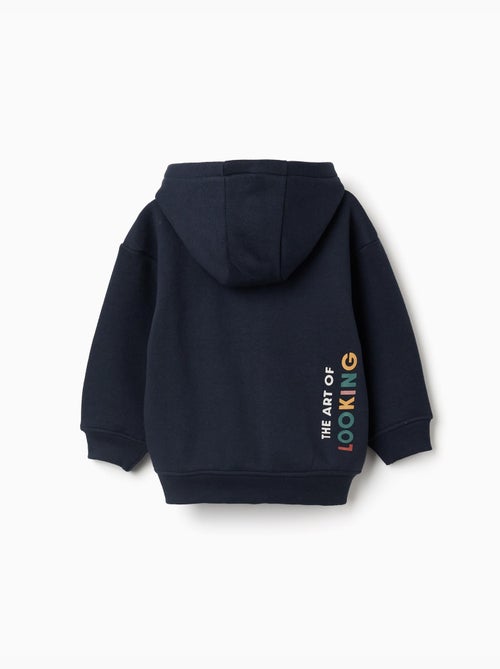Sweat zippé à capuche en coton peigné avec imprimé art of looking - Kiabi Sweat zippé à capuche en coton peigné avec imprimé art of looking - Kiabi