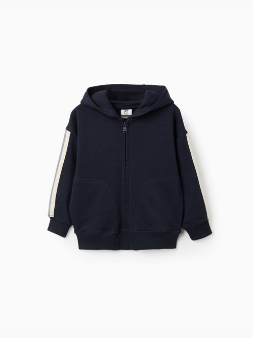 Sweat zippé en coton avec capuche et bande à rayures - Kiabi Sweat zippé en coton avec capuche et bande à rayures - Kiabi