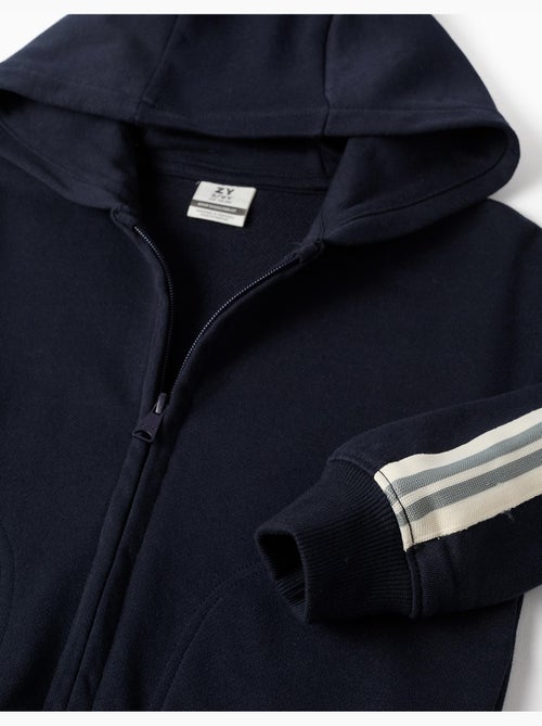 Sweat zippé en coton avec capuche et bande à rayures - Kiabi Sweat zippé en coton avec capuche et bande à rayures - Kiabi