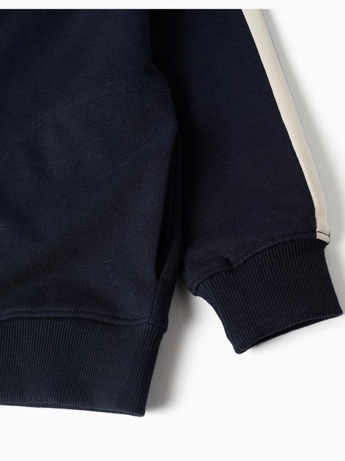 Sweat zippé en coton avec capuche et bande à rayures - Kiabi Sweat zippé en coton avec capuche et bande à rayures - Kiabi