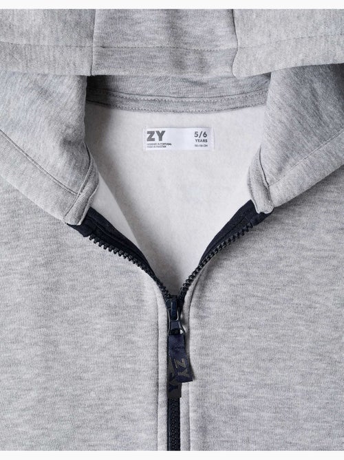 Sweat zippé en molleton avec capuche et doublure en coton peigné - Kiabi Sweat zippé en molleton avec capuche et doublure en coton peigné - Kiabi