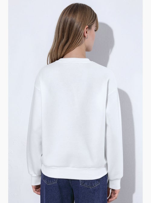 Sweatshirt col rond brodé de cœur hiccup - Kiabi Sweatshirt col rond brodé de cœur hiccup - Kiabi