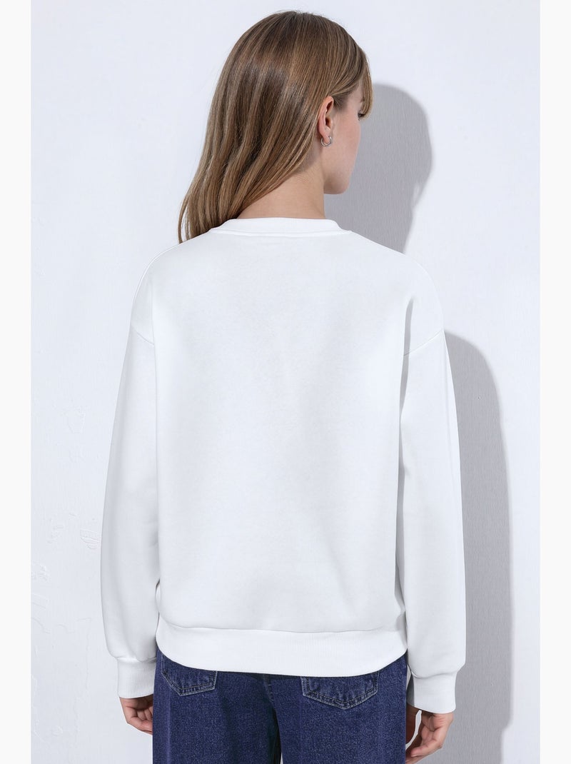 Sweatshirt col rond brodé de cœur hiccup Blanc - Kiabi
