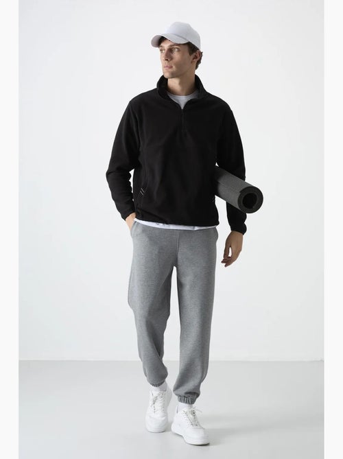 Sweatshirt homme coupe slim à demi-zip en tissu peluche tommy - Kiabi Sweatshirt homme coupe slim à demi-zip en tissu peluche tommy - Kiabi