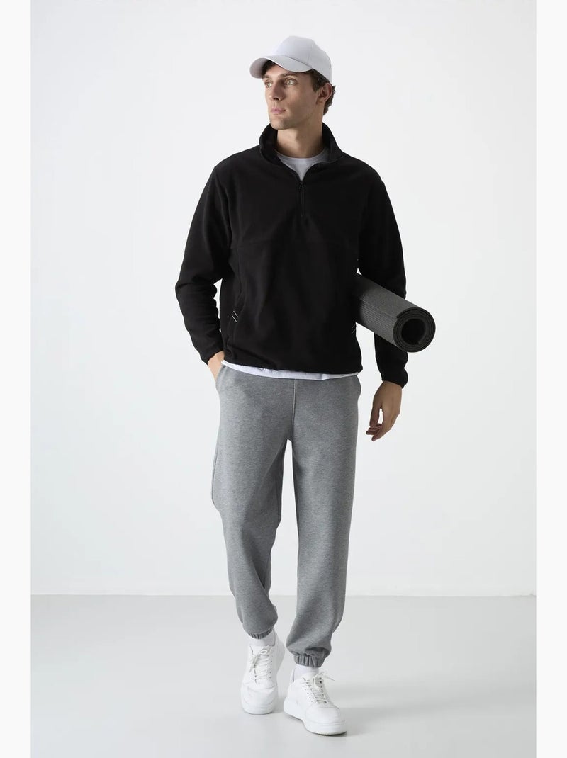 Sweatshirt homme coupe slim à demi-zip en tissu peluche tommy Noir - Kiabi