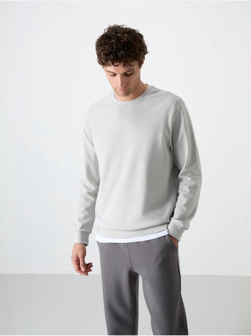 Sweatshirt homme uni à col rond tommy - Kiabi Sweatshirt homme uni à col rond tommy - Kiabi