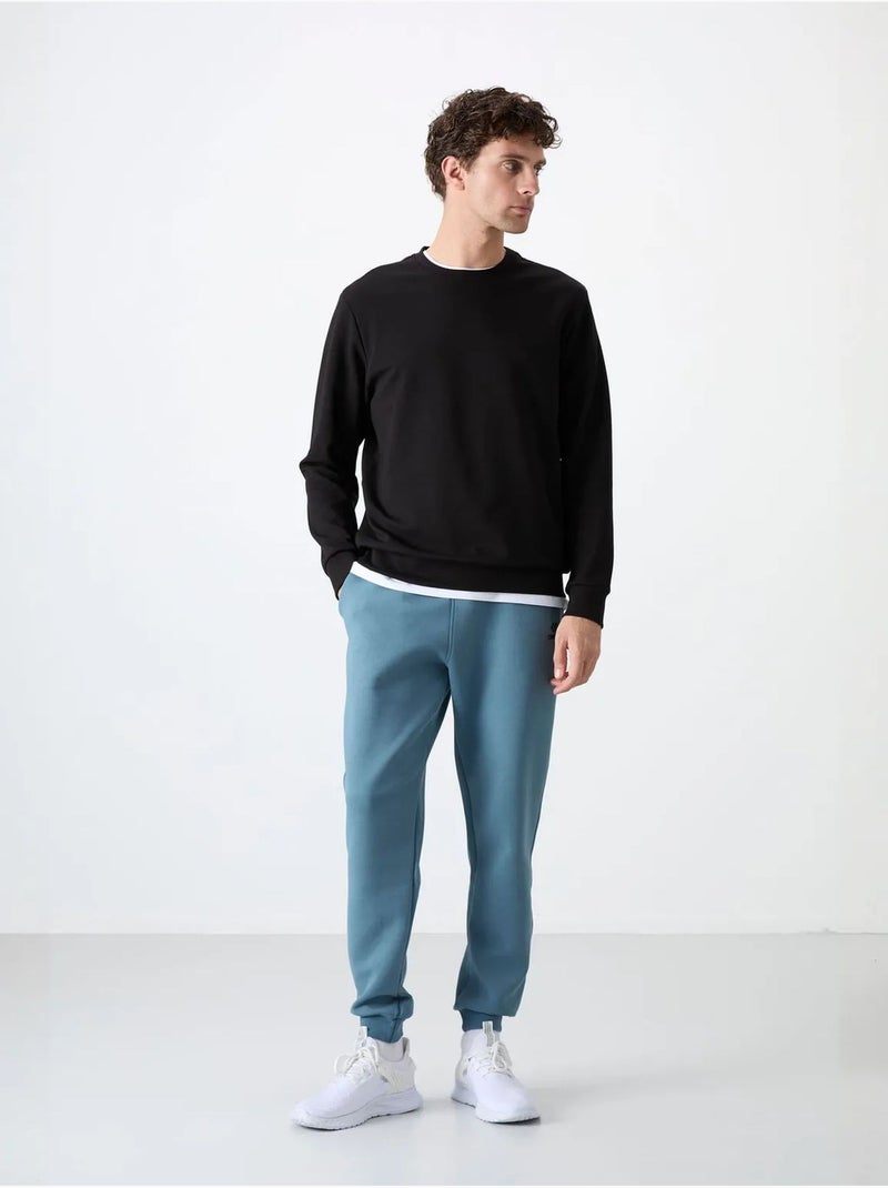 Sweatshirt homme uni à col rond tommy Noir - Kiabi