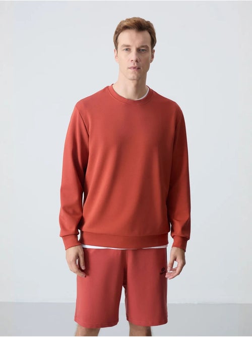 Sweatshirt homme uni à col rond tommy - Kiabi Sweatshirt homme uni à col rond tommy - Kiabi