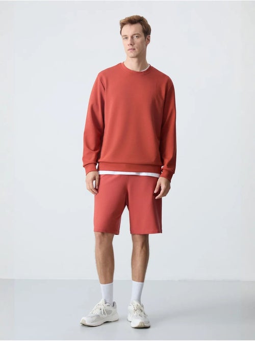 Sweatshirt homme uni à col rond tommy - Kiabi Sweatshirt homme uni à col rond tommy - Kiabi