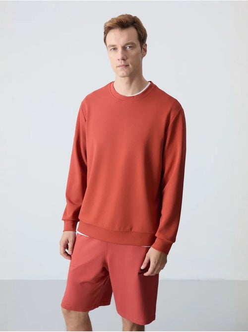 Sweatshirt homme uni à col rond tommy - Kiabi Sweatshirt homme uni à col rond tommy - Kiabi