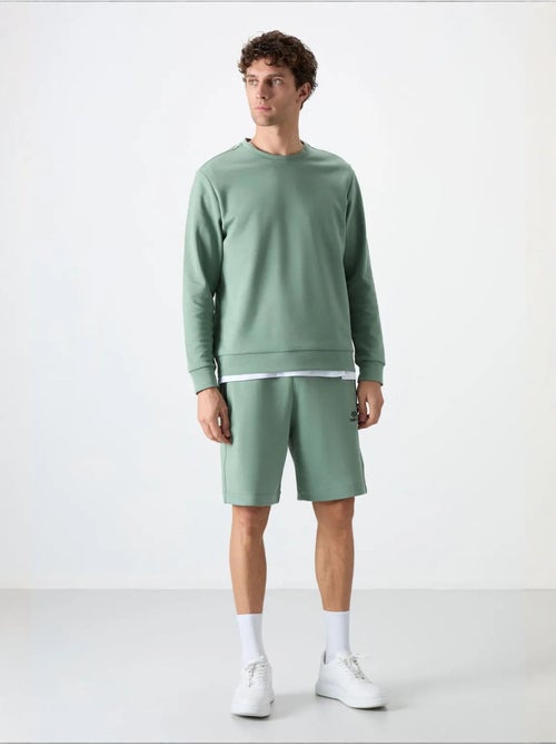 Sweatshirt homme uni à col rond tommy - Kiabi Sweatshirt homme uni à col rond tommy - Kiabi