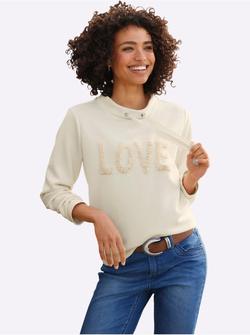 Sweatshirt inscription tendance - taille standard - helline - Kiabi Sweatshirt inscription tendance - taille standard - helline - Kiabi