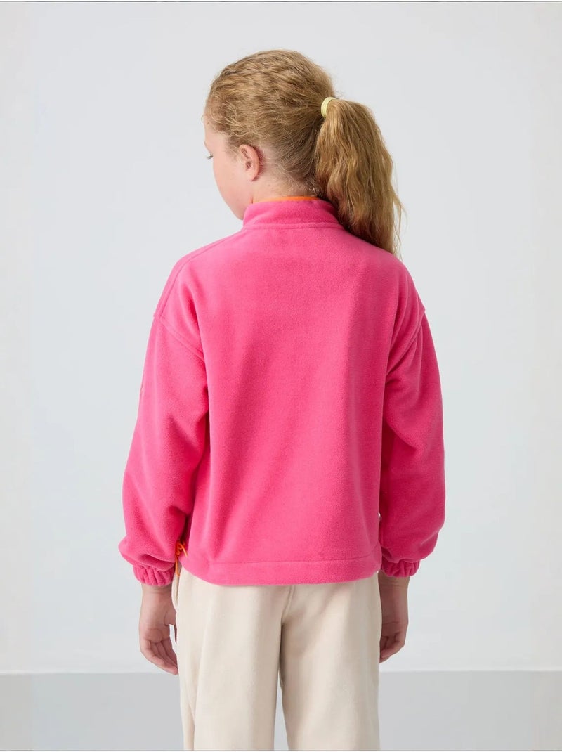 Sweatshirt jeunesse à fermeture éclair tommy Rose fluo/Solinotes - Kiabi