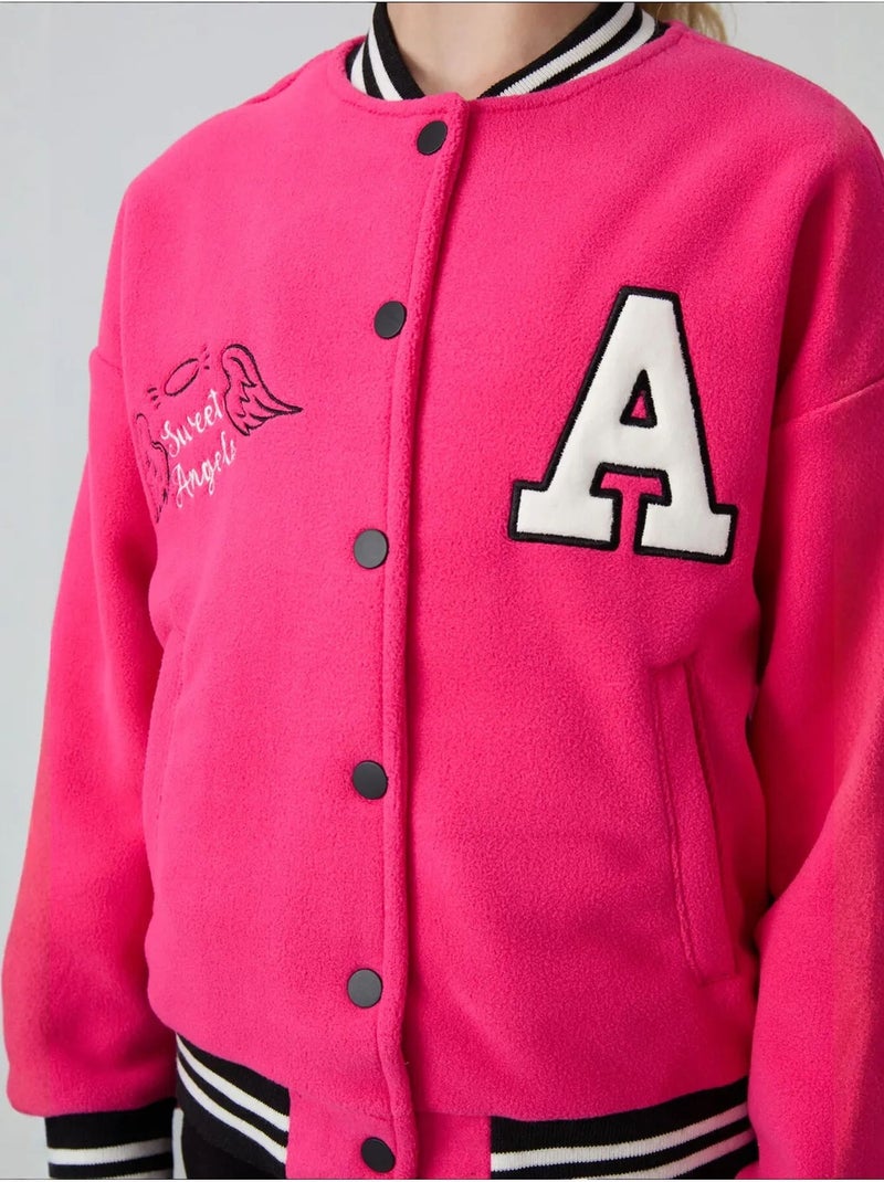 Sweatshirt jeunesse à pressions tommy Rose fluo/Solinotes - Kiabi