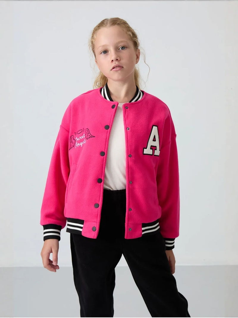 Sweatshirt jeunesse à pressions tommy Rose fluo/Solinotes - Kiabi