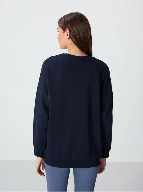Sweatshirt oversize à col rond tommy - Kiabi Sweatshirt oversize à col rond tommy - Kiabi