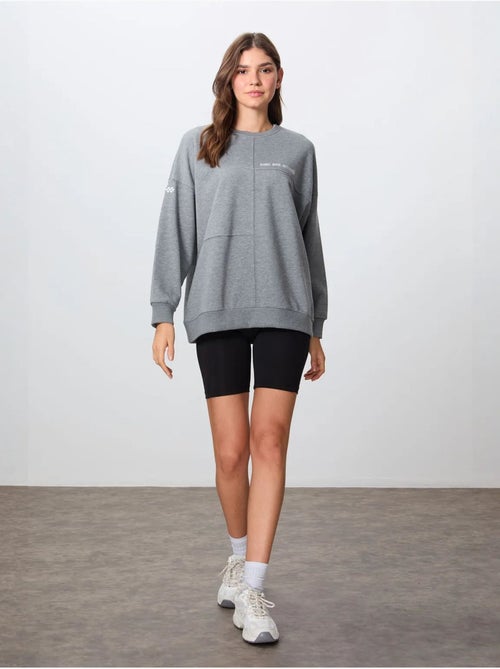 Sweatshirt oversize à col rond tommy - Kiabi Sweatshirt oversize à col rond tommy - Kiabi