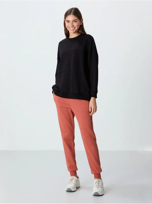 Sweatshirt oversize à col rond tommy - Kiabi Sweatshirt oversize à col rond tommy - Kiabi