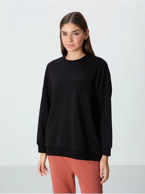 Sweatshirt oversize à col rond tommy - Kiabi Sweatshirt oversize à col rond tommy - Kiabi