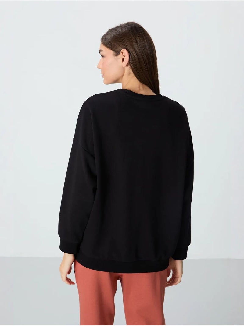 Sweatshirt oversize à col rond tommy Noir - Kiabi