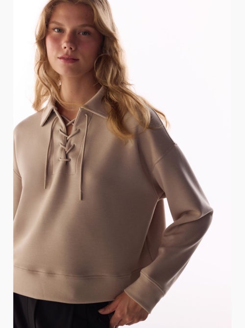 Sweatshirt silky touch à lacets et manches longues penti - Kiabi Sweatshirt silky touch à lacets et manches longues penti - Kiabi