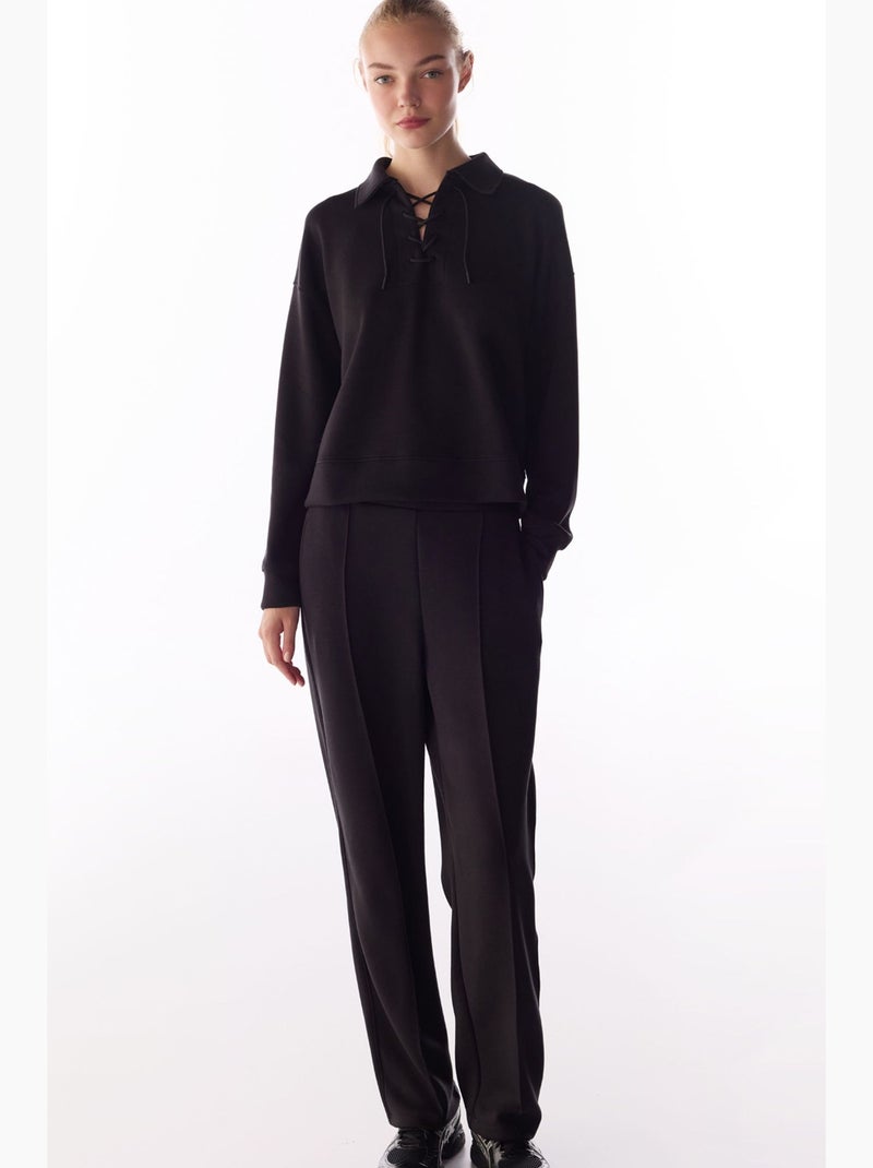 Sweatshirt silky touch à lacets et manches longues penti Noir - Kiabi