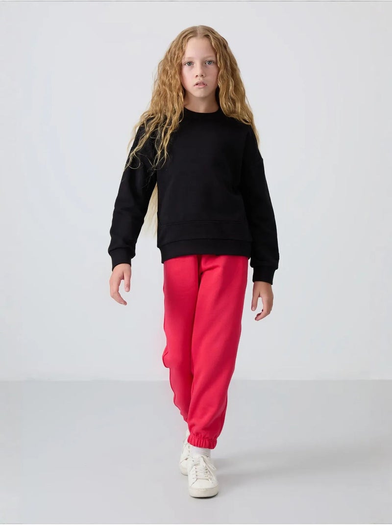 Sweatshirt unisexe jeunesse en mélange de coton tommy Noir - Kiabi