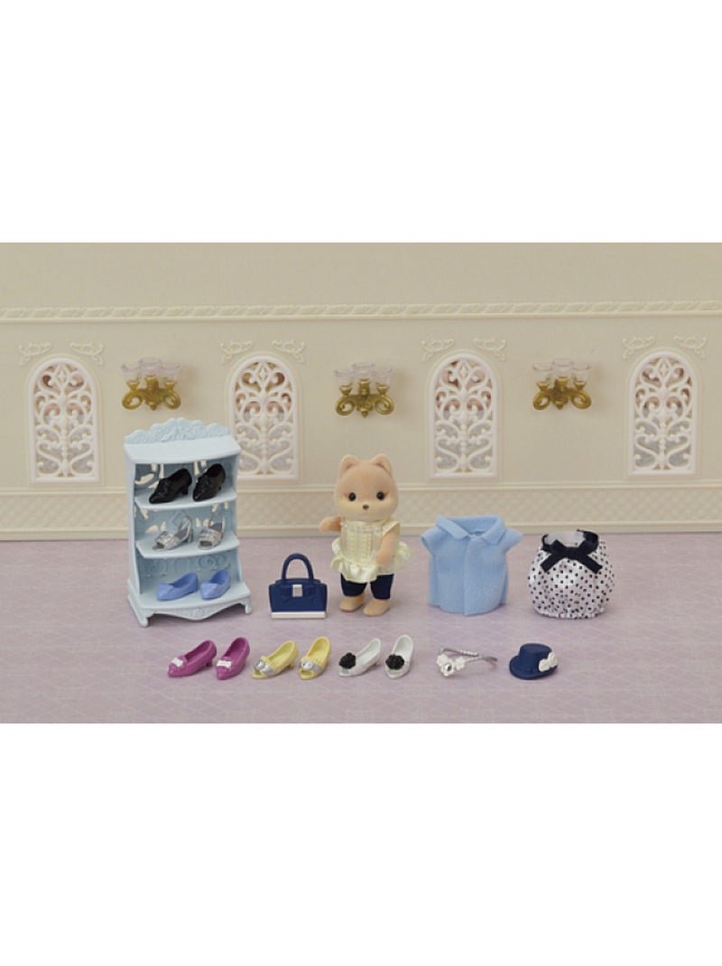 Sylvanian Families 5541 :  La valisette de mode et grande soeur chien caramel Bleu - Kiabi