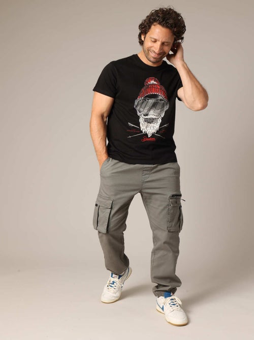 T-shirt 100% coton avec illustration originale d'un skieur barbu au style vintage. 'Deeluxe' - Kiabi
