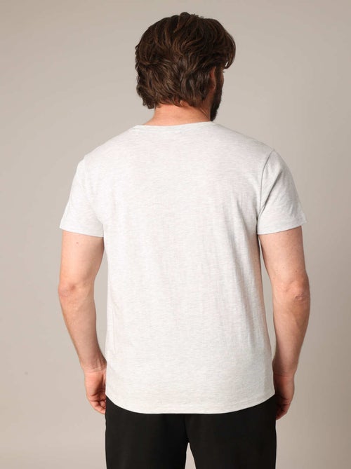 T-shirt 100% coton avec imprimé squelette coureur, col rond et coupe droite. 'Deeluxe' - Kiabi