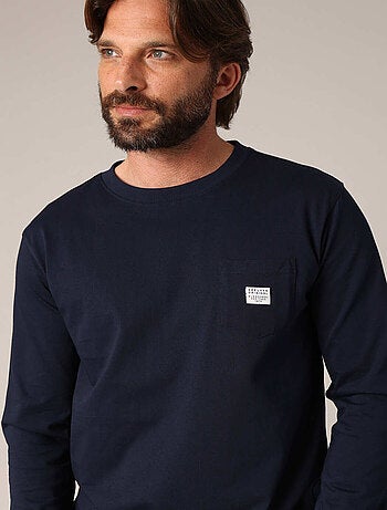 T-shirt 100% coton BCI avec poche plaquée sur la poitrine et étiquette brodée. 'Deeluxe'
