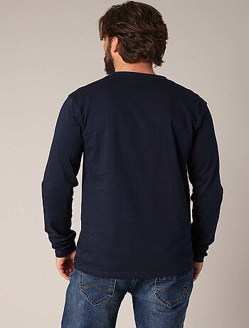 T-shirt 100% coton BCI avec poche plaquée sur la poitrine et étiquette brodée. 'Deeluxe'