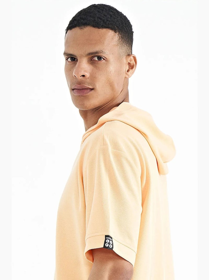 T-shirt à capuche oversize avec détails d'accessoires tommy Orange clair - Kiabi