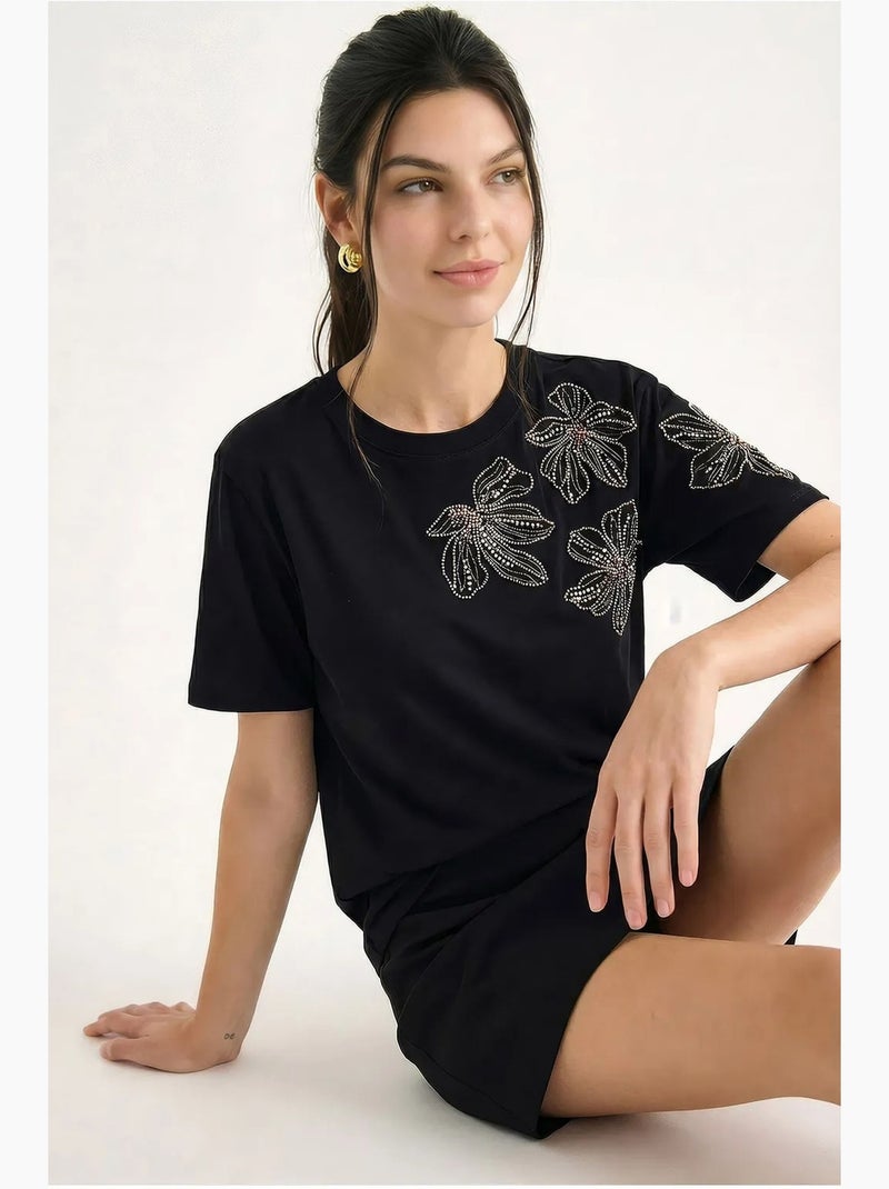 T-shirt à col rond brodé de fleurs lucci Noir - Kiabi