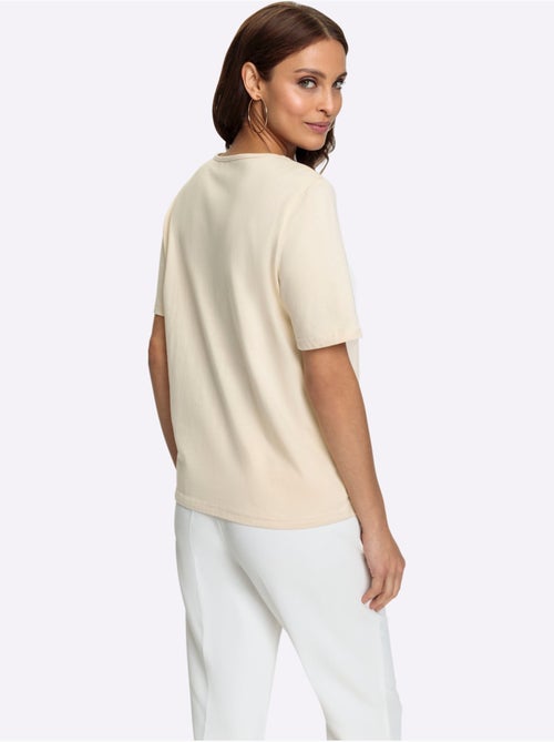 T-shirt à encolure ronde avec échancrures et pierres brillantes - Taille standard - Witt - Kiabi T-shirt à encolure ronde avec échancrures et pierres brillantes - Taille standard - Witt - Kiabi