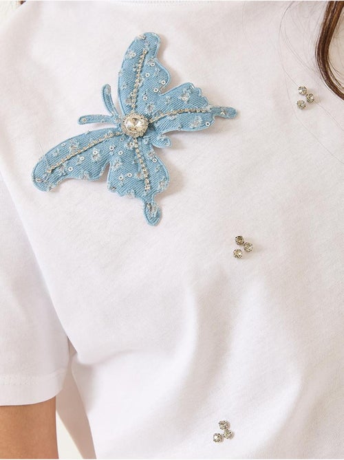 T-shirt à manches courtes avec accessoires papillon et ornements en pierre lucci - Kiabi