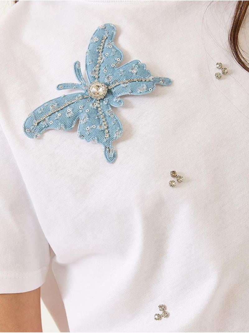 T-shirt à manches courtes avec accessoires papillon et ornements en pierre lucci Blanc - Kiabi