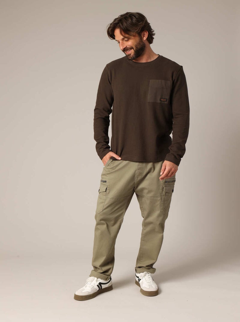 T-shirt à manches longues 100% coton avec poche poitrine contrastée.
 'Deeluxe' Vert foncé - Kiabi