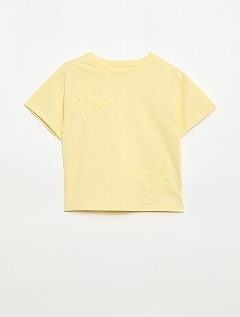 T-shirt avec fleurs en macramé