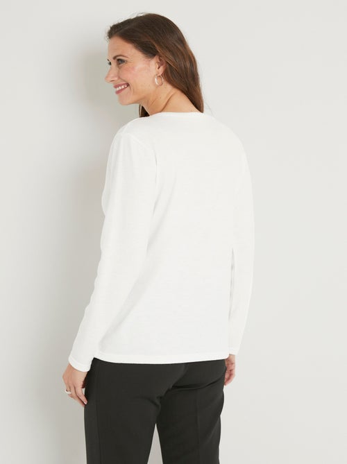T-shirt chaud uni manches longues clous et rivets - Kiabi T-shirt chaud uni manches longues clous et rivets - Kiabi
