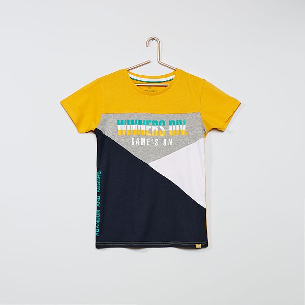 comme des garçons t shirt jaune