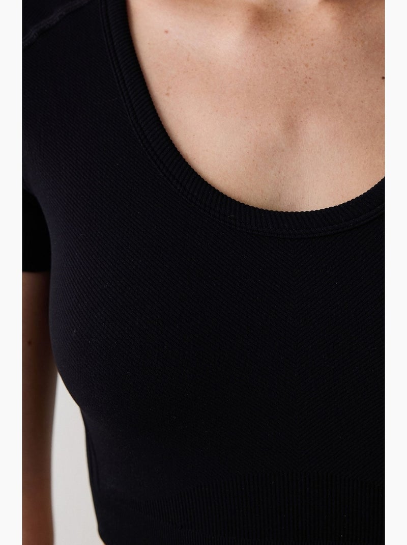 T-shirt de sport court manches courtes sans coutures ajusté penti Noir - Kiabi