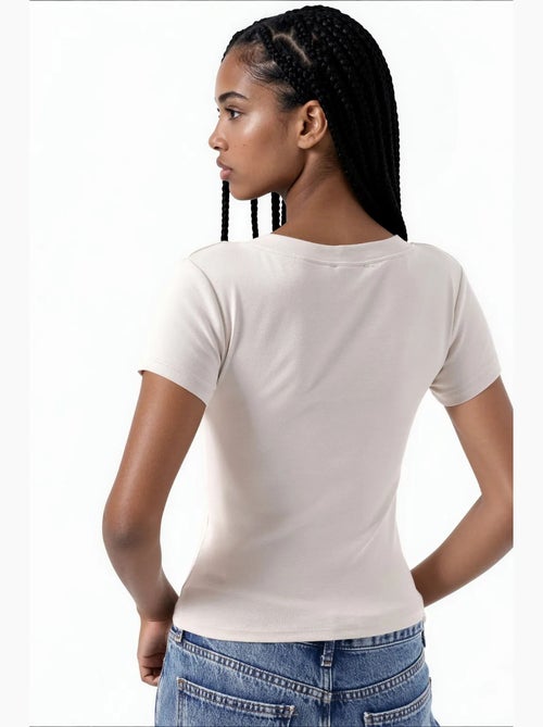 T-shirt élastique à manches courtes avec col en v busem - Kiabi T-shirt élastique à manches courtes avec col en v busem - Kiabi